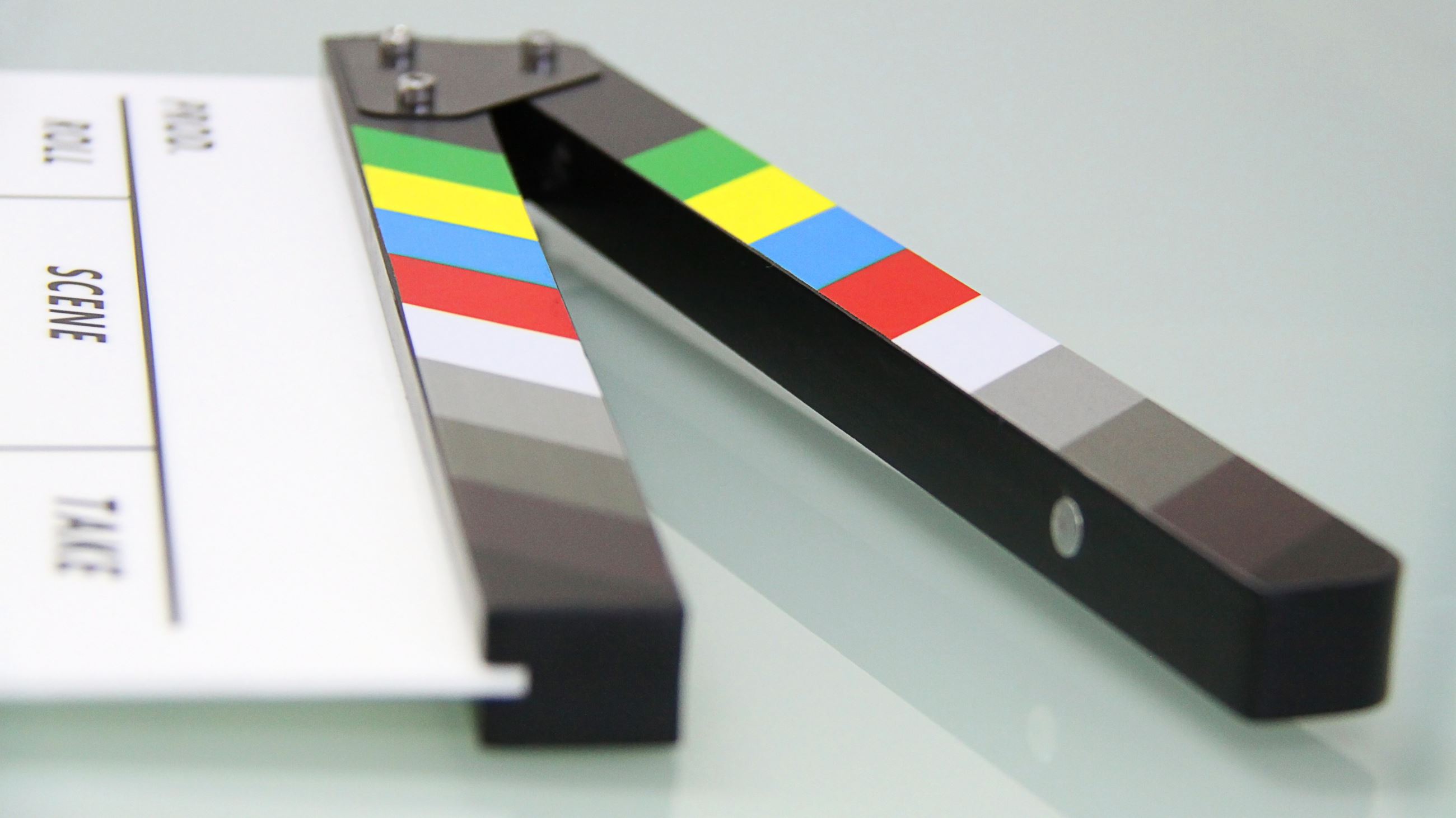 Photo showing the clapper edge of a movie scene marker.