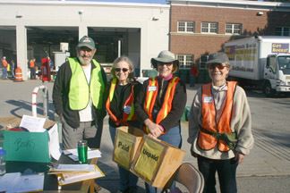 Group of People Holding Paid and Unpaid Boxes