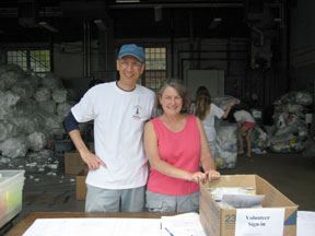 Couple Standing at the Check-In Table